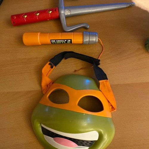 Ninja Turtle mask and weapons used