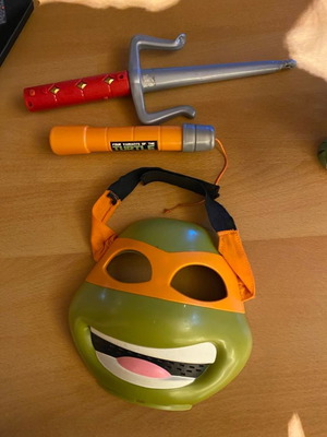 Ninja Turtle mask and weapons used