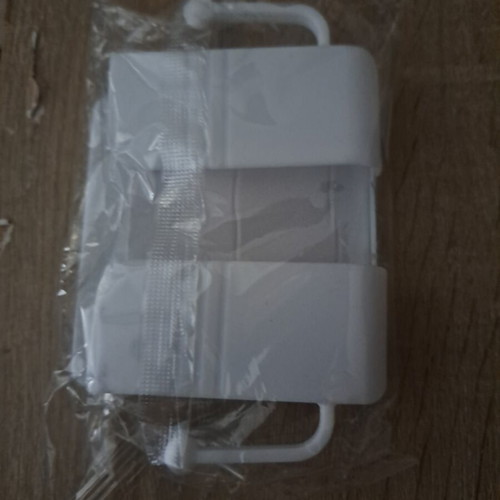 White wall-mounted plastic holder organizer for mobile phone or remote