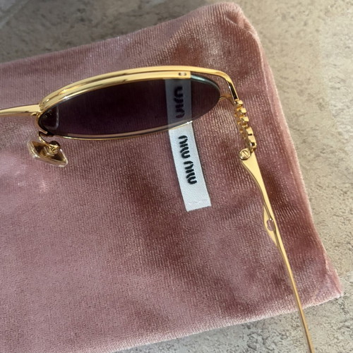 Miu Miu SMU52Y sunglasses like new, multicolor metal frame