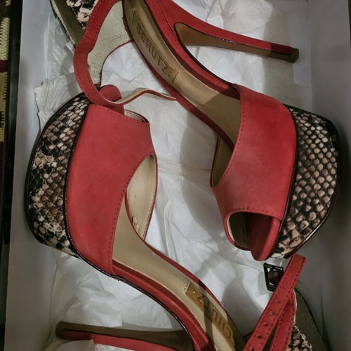 Schutz red sandals with thin heel and snake pattern used