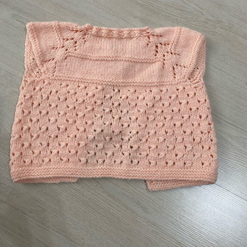 Knitted baby vest like new in peach color