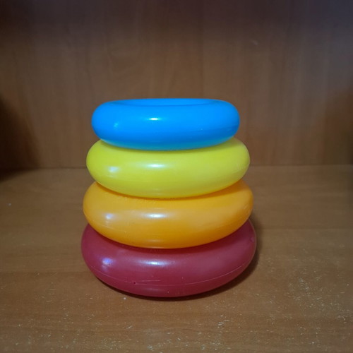 Fisher-Price baby pyramid used, for 6 months and older, 4 rings missing base