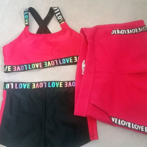 Girls' beach set used, swimsuit with crisscross back and shorts