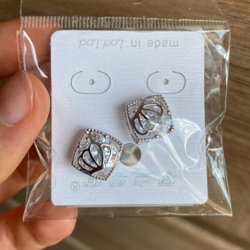 Earrings silver color with crown design and small diamond new