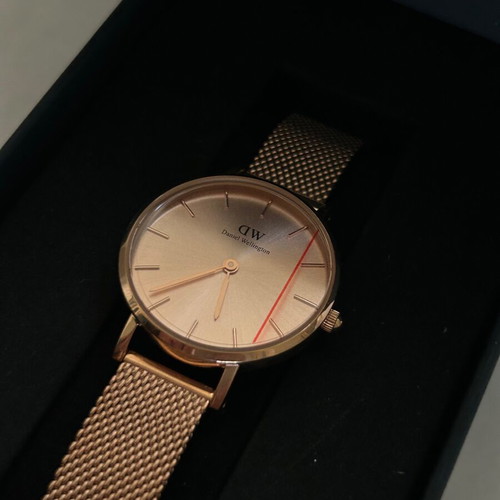 Daniel Wellington Petite Unitone watch with rose gold metal bracelet