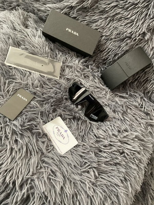 Prada sunglasses new with polarized lenses and accessories