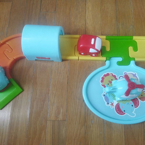 Fisher Price car track used with 2 cars and helicopter