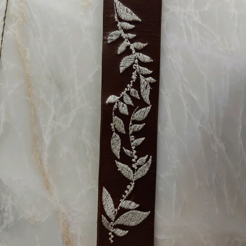 Belt with designs used Accessorize, size 95, white and brown