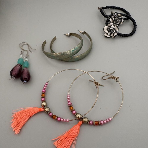 Dangling earrings used, assorted styles
