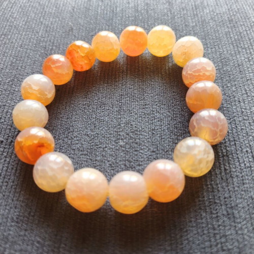 Bracelet with orange beads elastic, like new