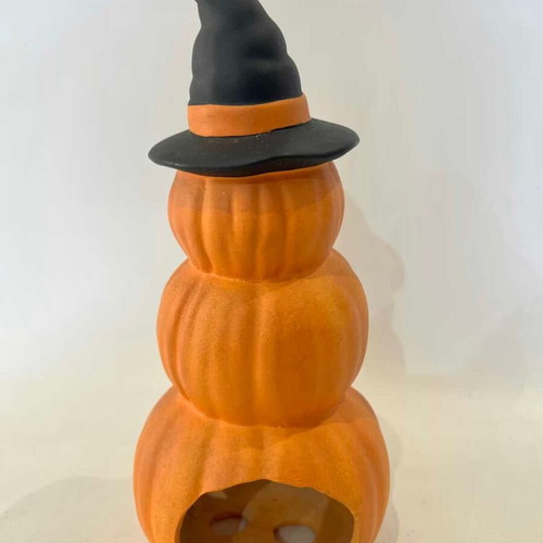 Ceramic Halloween pumpkin candle holder used