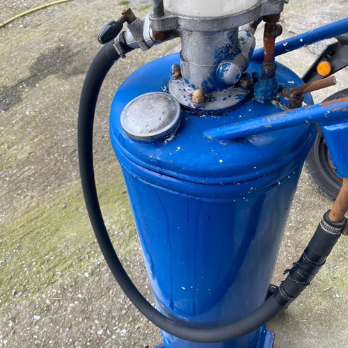 Oil and gasoline pump used with glass container
