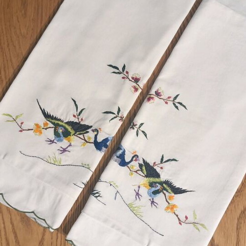 Pillowcases with peacocks used, hand-embroidered 1950s folk art