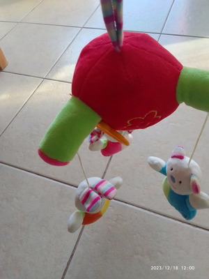 Baby toy used, hand-operated spinning with sound, plush hanging
