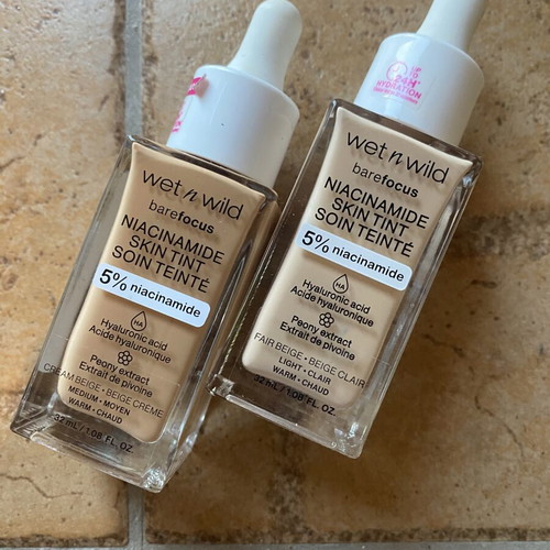 Wet n Wild Skin Tint like new, two shades Light and Warm