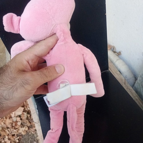 Pink Panther plush used with discoloration and pen stain