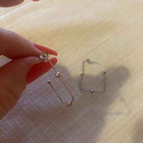 Earrings used, fake very light, silver color