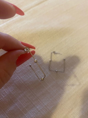 Earrings used, fake very light, silver color