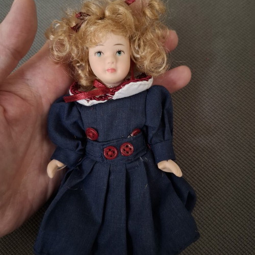 Porcelain doll small used, decorative for baby room or gift