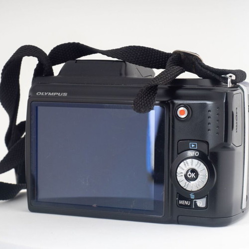 Olympus SP-620UZ Digital Bridge Camera used with slight battery door gap