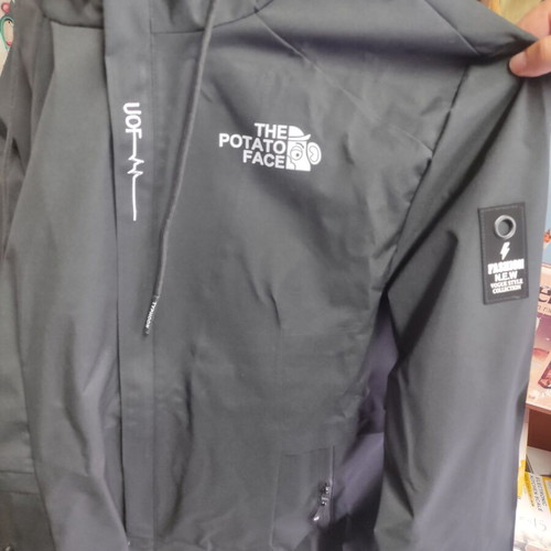 Black waterproof windbreaker jacket, men's size L