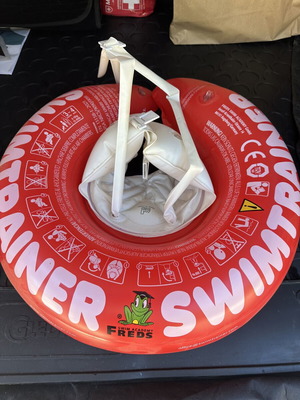 Freds Red SwimTrainer like new, 3 months to 4 years, gift included