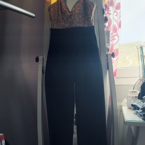 One-piece jumpsuit used, pink sequin top, flared pants, size S-M