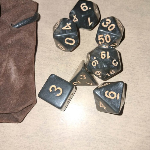 Runic leather dice bag with black marbled D&D dice set