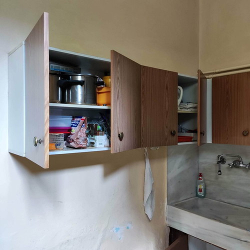 Kitchen cabinets used, two rows made of novopan