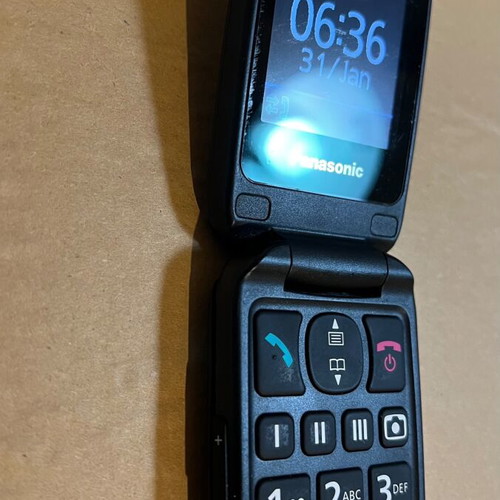 Panasonic KX-TU466 EXBE Black used clamshell phone with SOS button