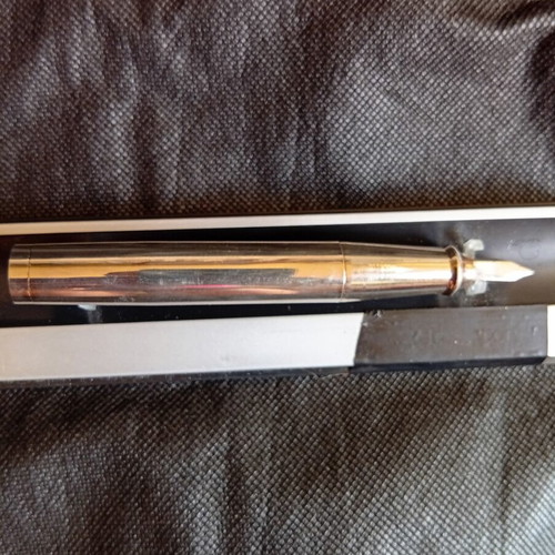Parafernalia pen used, metal chrome finish, 1980s design