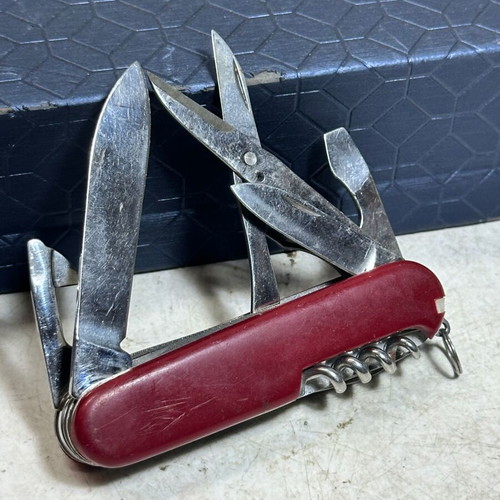 Vintage Swiss Army Pocket Multitool with Scissors and Corkscrew used
