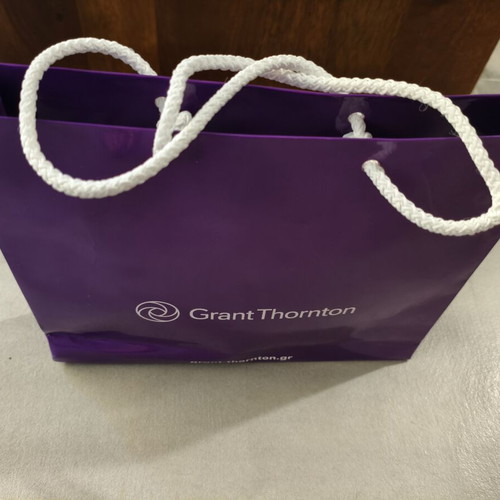 Grant Thornton promotional set with notebook, pen, lanyard, pouch