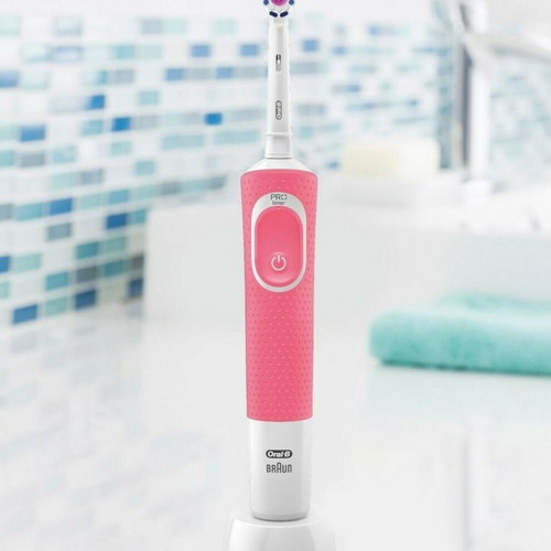 Oral B Braun electric rechargeable toothbrush like new, fuchsia