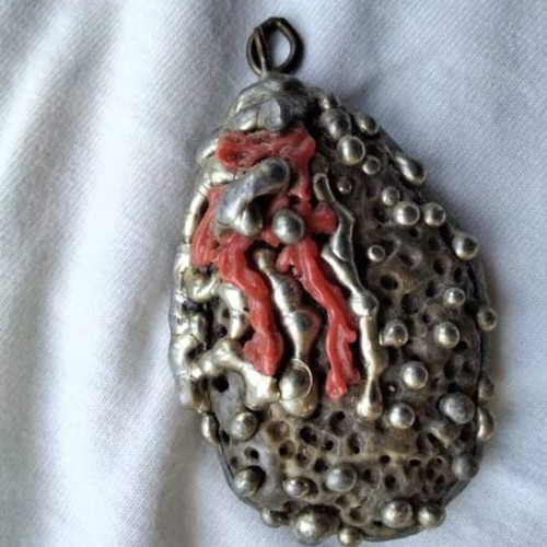 Vintage pendant like new made of stone, tin, and coral