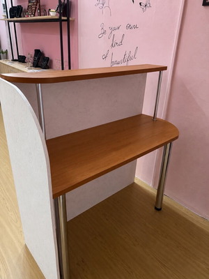 Reception desk used with chair