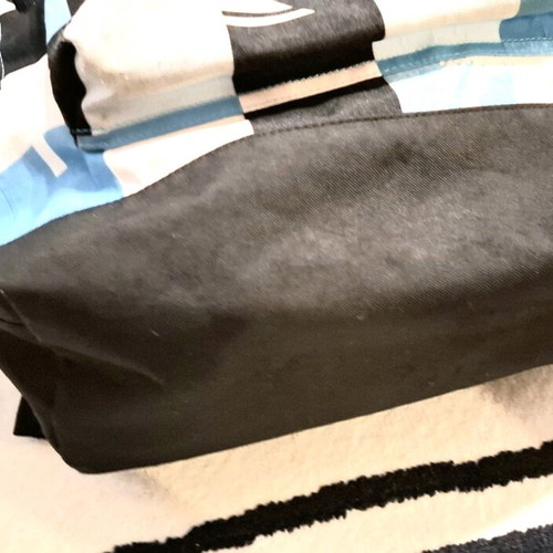 Collectible Quicksilver blue checkered school bag, with slight wear on the front pocket. Unique