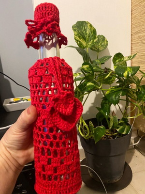 Bottle cover new, sold with the bottle