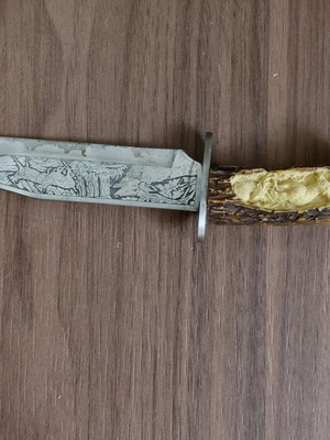 Engraved knife with deer antler handle custom made