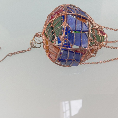 Handmade hot air balloon pendant with copper and glass used