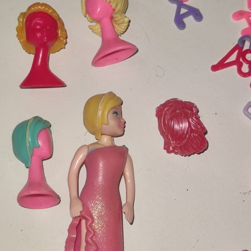 Polly Pocket bag with 9 dolls and accessories used