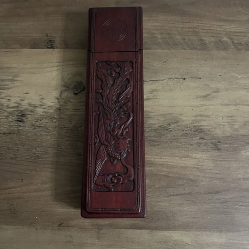 Japanese wooden box with 16 used chopsticks and palm carving
