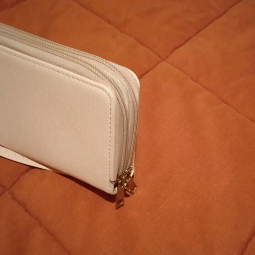 Women's wallet used, pink with detachable strap