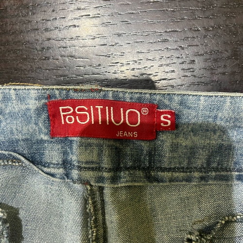 Positivo Capri jeans size S like new, light color with red details