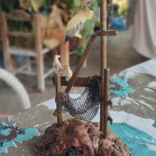 Vintage sea-themed decoration handmade from metal and cork used