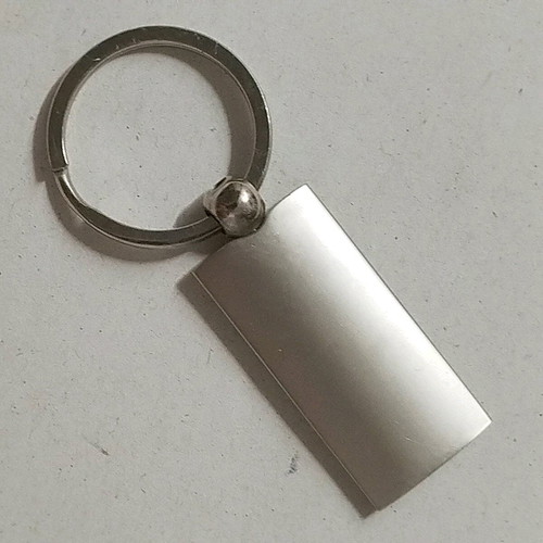 Rolls-Royce keychain like new, silver with pearl finish
