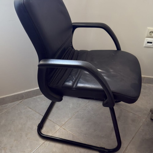 Leather office chair used with soft seat and armrests