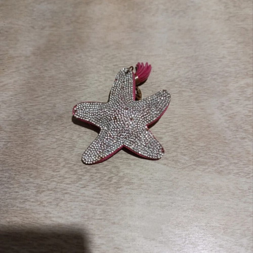 Star keychain with rhinestones used, pink and silver