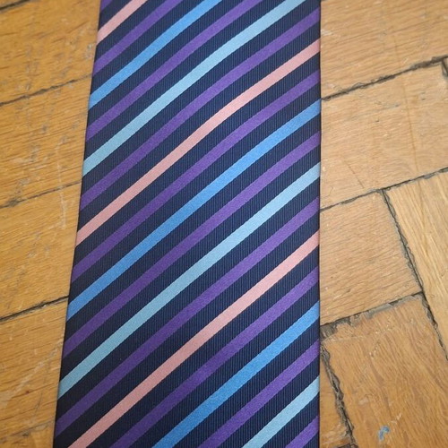 Otomelara tie with diagonal stripes in purple, black, mauve and blue